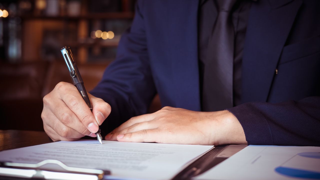 man writing law